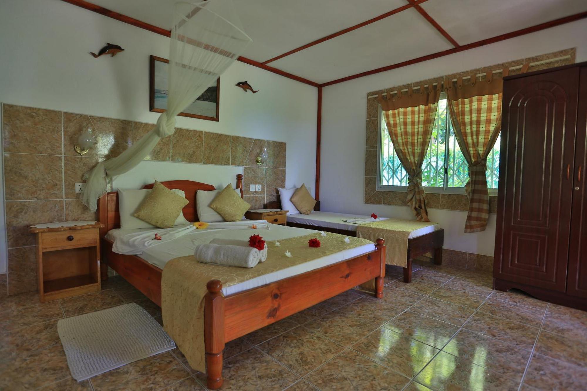 Rising Sun Guesthouse Ла-Диг Номер фото